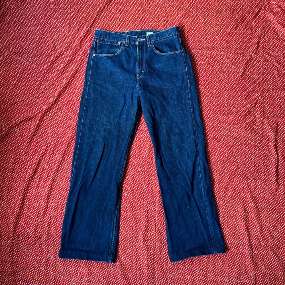 2000s Levis 557 Relaxed Boot Fit Jeans Dark Wash Denim W31 L39 vintage style